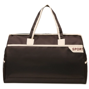 Large travel duffel bag in brown and cream patchwork with dual handles and sport logo