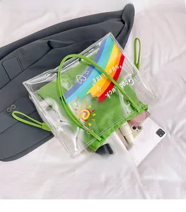 Spacious PVC tote bag with green drawstring pouch showing tablet and cosmetic storage