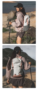 Detail view of large outdoor backpack with side mesh pockets and adjustable buckle system