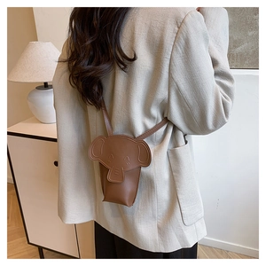 Brown elephant shaped mini crossbody bag detail showing PU leather stitching and strap