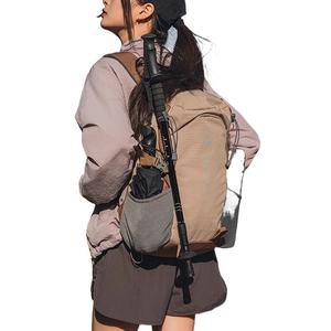 Khaki outdoor hiking backpack with large capacity and multi-pocket side storage on white background