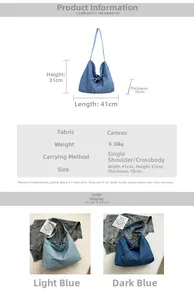 Detailed view of large denim tote bag dimensions 41x31x10cm with embroidered detail
