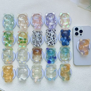 Magnetic bear phone grips with glitter and dried flowers in various pastel colors