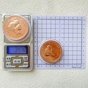 Detail showing coin diameter of 4.5cm and weight 34.78g with copper female relief