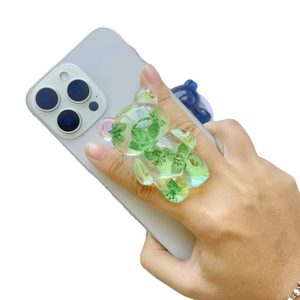 Magnetic wavy bear phone grip with translucent green flower resin for steady grip