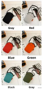 Detailed grid view showing minimalist canvas crossbody bags in six vibrant trendy colors