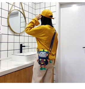 Vue arrière du petit sac robot avec bandoulière réglable et détails colorés originaux