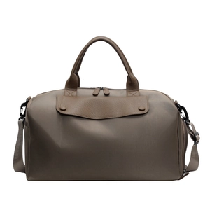 Large taupe Oxford travel bag with brown leather accents and adjustable shoulder strap