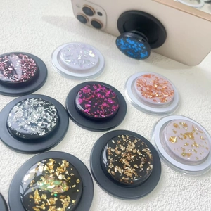 Sparkly gold leaf glitter MagSafe phone socket with expanding grip and resin finish