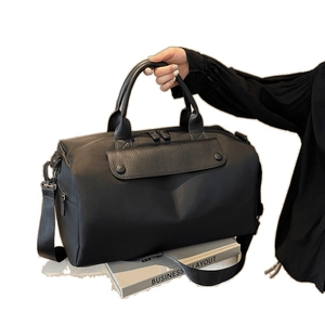 Black Oxford fabric sports gym bag with adjustable shoulder strap and leather accents