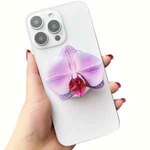 Pink orchid acrylic MagSafe phone grip on transparent iPhone case with realistic textures