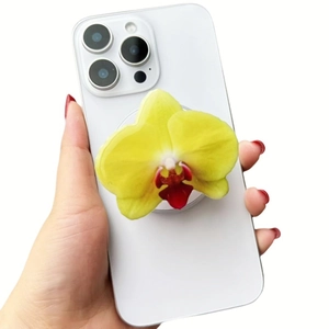 Yellow orchid acrylic magnetic phone grip holder for Magsafe attached to back of phone