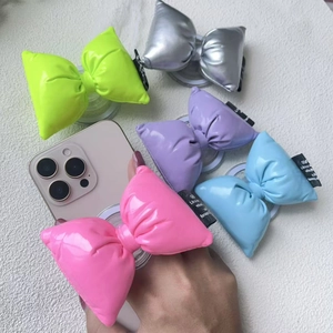 Magnetic bow phone grip stand in neon green, silver, purple, pink and blue leather