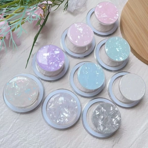 Magnetic MagSafe phone grips with iridescent shell patterns in multiple colors