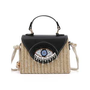 French straw woven crossbody bag with leather flap and beaded evil eye embroidery