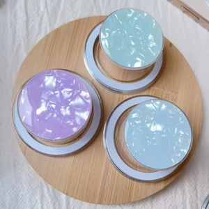 Detailed view of three pearl resin magnetic phone grips in purple, mint, and blue shades