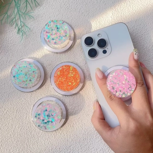 Sparkly glitter magsafe phone socket with colorful sequins and stars for easy grip