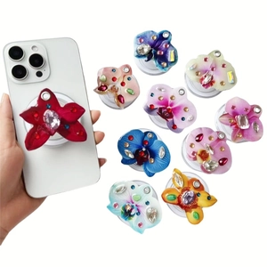 Magnetic flower diamond phone socket grip in various colors and orchid floral shapes