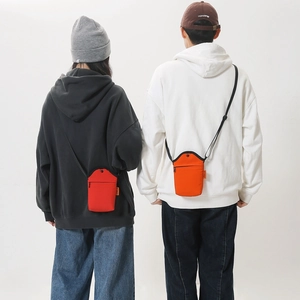Vertical red and orange canvas shoulder bags for phones with adjustable straps