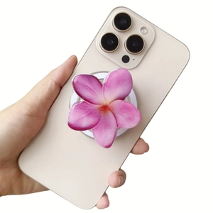 Detail of pink gradient frangipani acrylic MagSafe magnetic phone holder on back of mobile