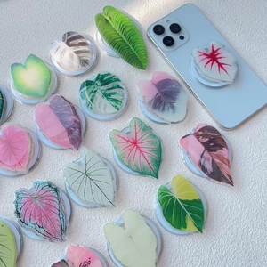 Magnetic tropical leaf phone socket grip series featuring monstera patterns on acrylic
