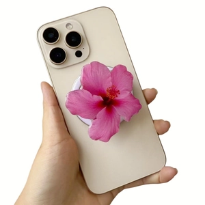 Magnetic flower phone grip stand with pink hibiscus acrylic design on iPhone