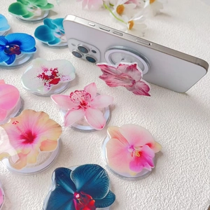 Floral magnetic folding phone stand with orchid acrylic design on white smartphone