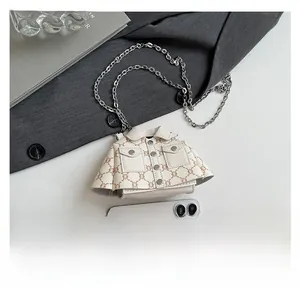 Unique jacket-shaped crossbody bag with chain strap shown beside phone for size reference