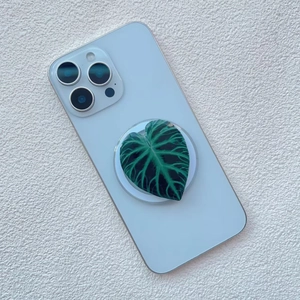 Artistic Alocasia leaf phone grip with realistic green leaf vein texture detail