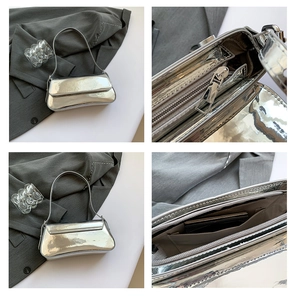 Detail view of silver patent leather bag showing interior pockets and metal zipper hardware