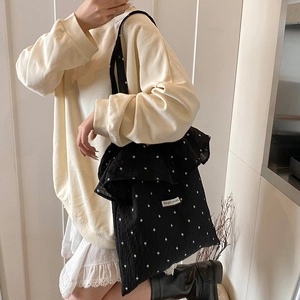 Minimalist black floral tote bag with ruffle trim and large capacity for casual daily wear