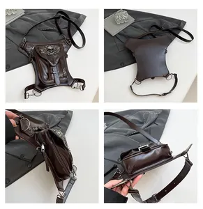 Detail view of steampunk leg bag with silver skull ornament and adjustable straps