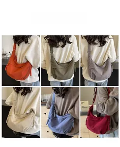 Collage of large canvas crossbody dumpling bags in six colors with adjustable straps