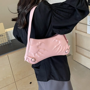 Pink baguette shoulder bag with 3D flame relief pattern and silver metal hardware