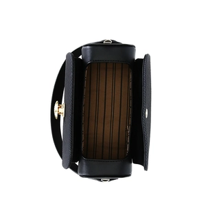 Top view of black leather handbag featuring classic brown striped lining and gold hardware