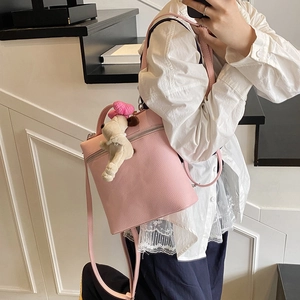 Pink lychee texture small leather backpack with cute puppy pendant for women