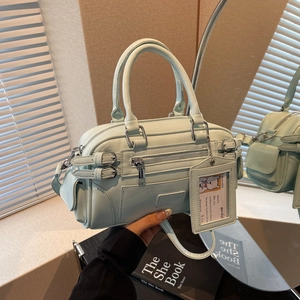 Light blue PU leather bowling bag with top handles and adjustable shoulder strap