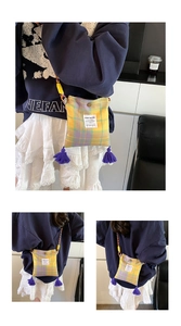 Detail of checkered crossbody bag with colorful tassels and braided rope strap