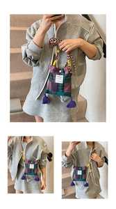 Detail of checkered crossbody bag with purple fringe and woven rope shoulder strap