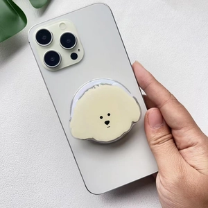 Cute white puppy acrylic phone grip and stand attached to a grey smartphone