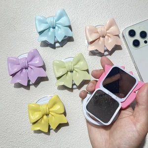 Support téléphone nœud magnétique et miroir de maquillage pliable en tons pastel