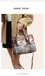 Detail of vintage patchwork tote bag with adjustable shoulder strap and denim texture