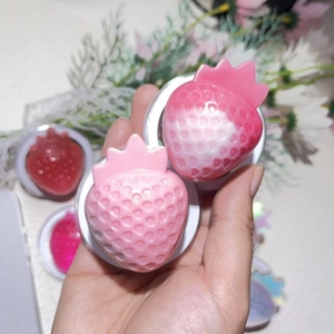Detailed macro shot of creative strawberry shaped MagSafe phone grip with gradient finish