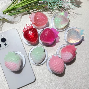 Detail of colorful resin strawberry phone grips with magnetic magsafe telescopic stands