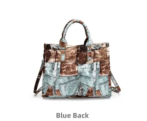 Detail view of vintage denim patchwork print tote bag back with slim shoulder straps