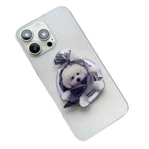 Cute cartoon puppy Magsafe phone socket stand on a white smartphone back