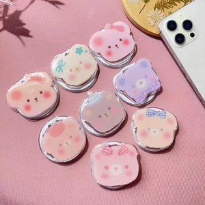 Detailed group view of 8 cute acrylic cartoon bear pop-up phone grips in pastel colors