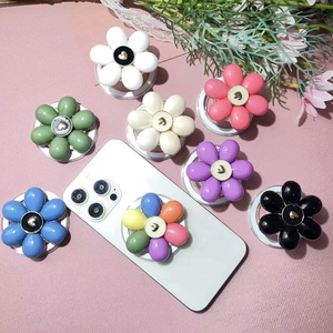 Floral heart phone socket stand set in multiple colors with retractable grip design