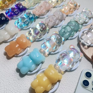 Gummy bear phone grip collection with colorful laser finishes and holographic details