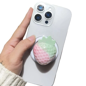 Magnetic strawberry phone grip with pink gradient and 3D textured resin surface